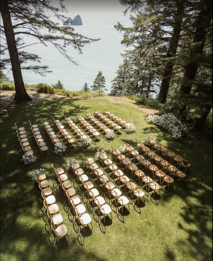 Outdoor wedding ceremony setup at Crook Point overlooking the ocean.